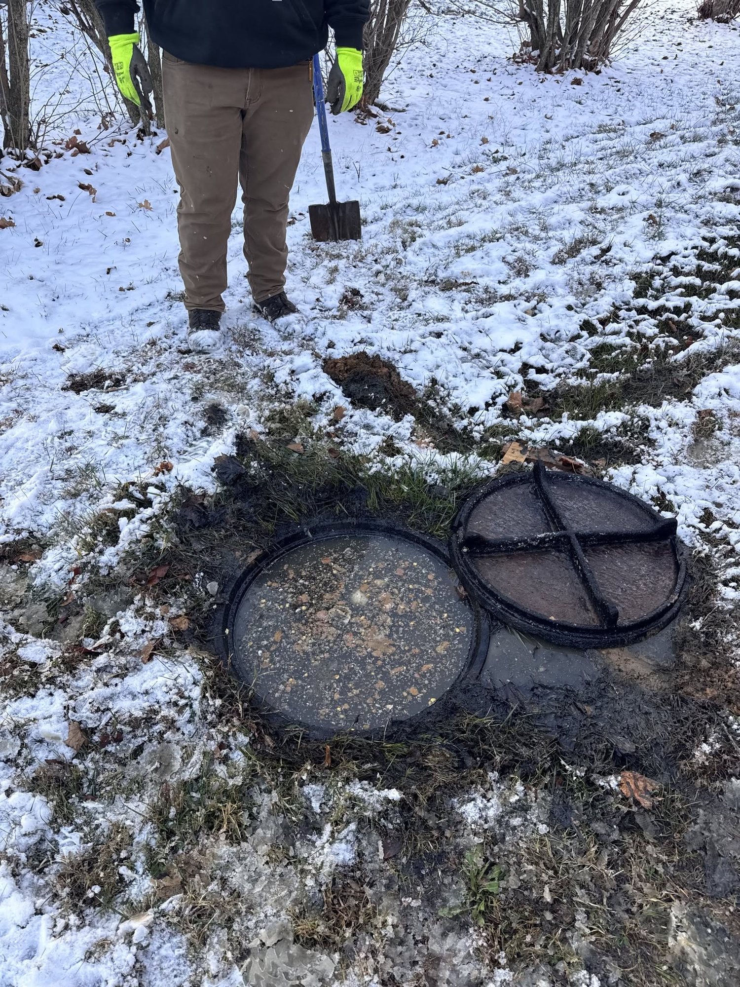 Open septic tank during inspection