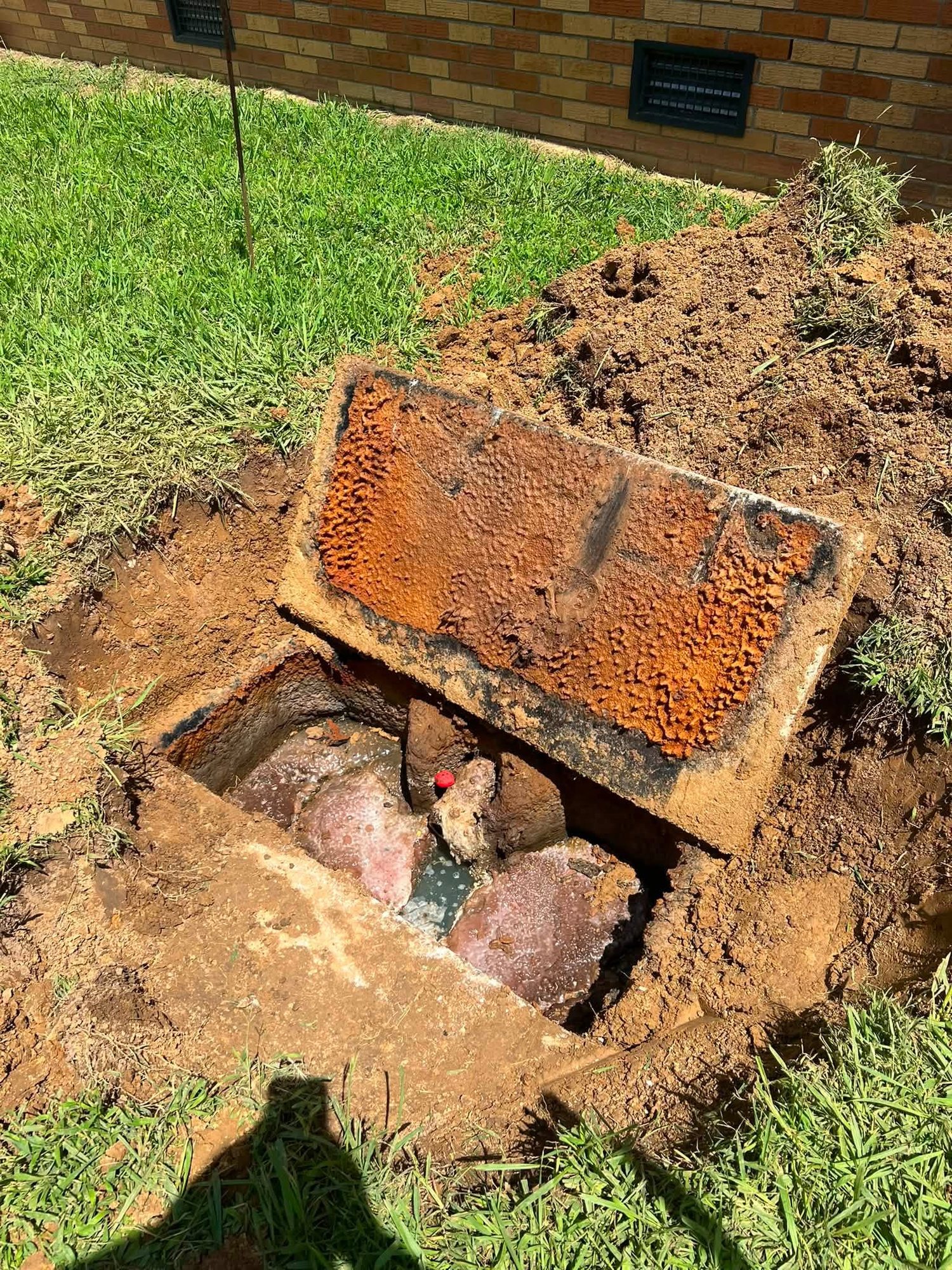 Open septic tank ready for pumping